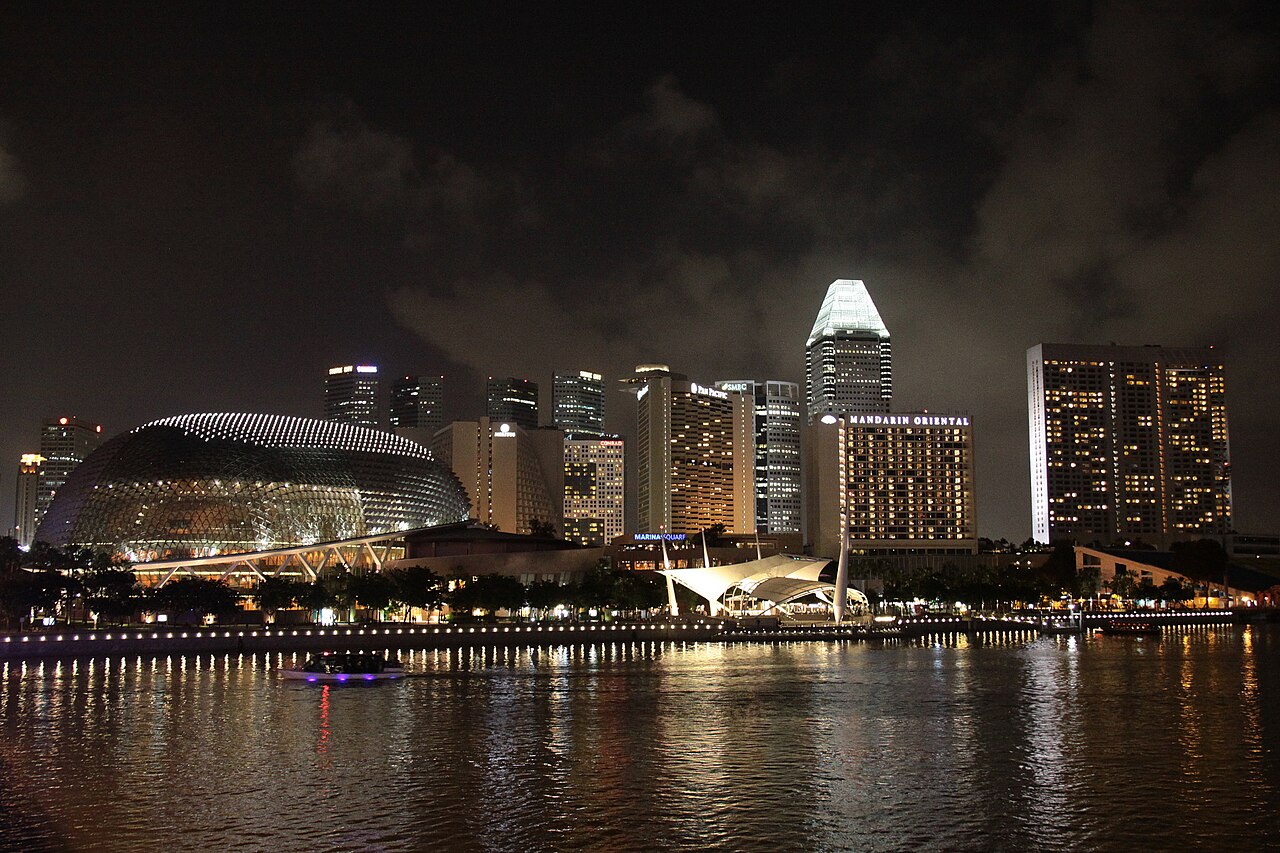 Bangkok riverside skyline glowing at night